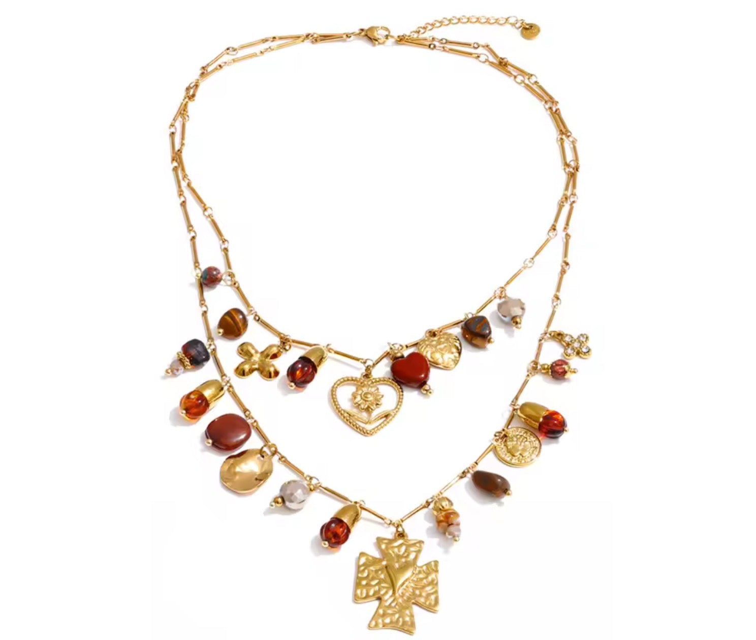 Collana multilayer con charms e dettagli colorati.
Un gioiello ricco di personalità che non passa inosservato: doppia catena con pendenti mixati tra simboli, perle e dettagli colorati per un effetto unico e super stiloso.

Perfetta per dare carattere anche agli outfit più semplici, aggiungendo subito un tocco boho-chic e ricercato.